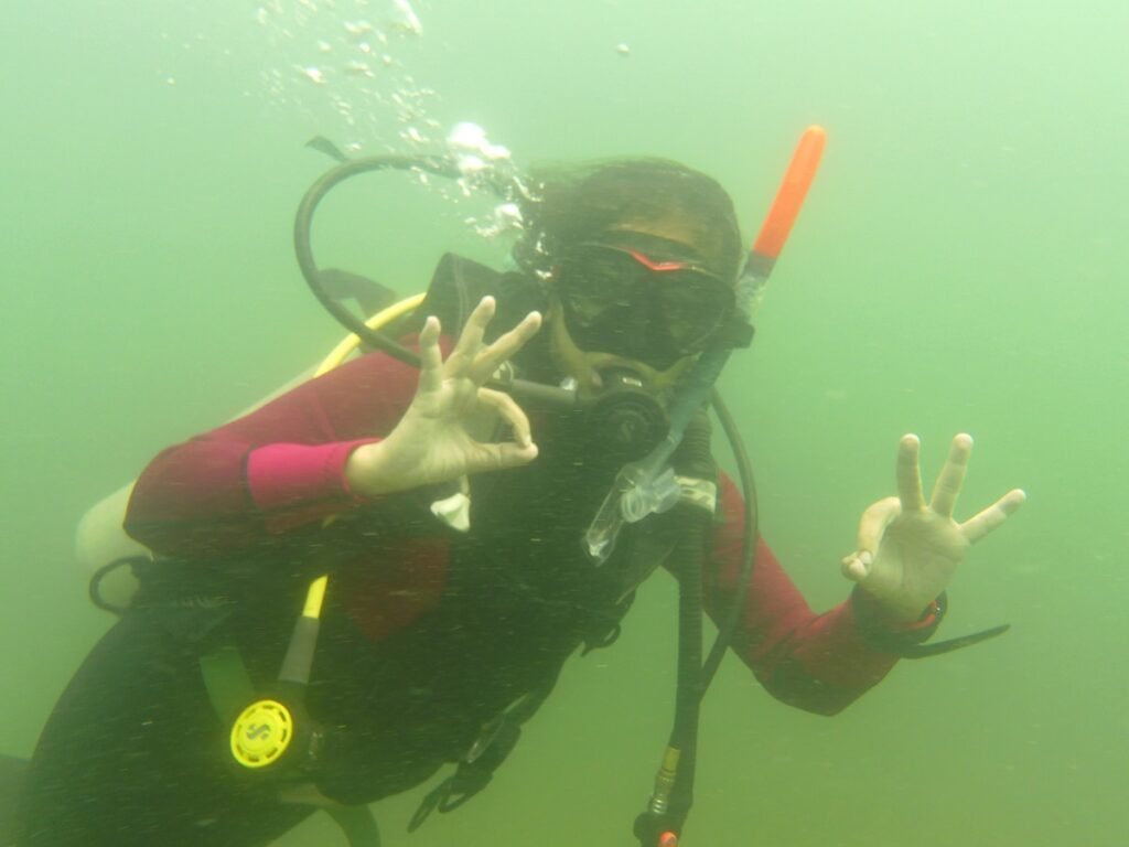 a girl posing underwater